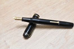 A Conway Stewart No286 lever fill fountain pen in black having Conway Stewart 14ct gold nib
