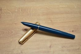 A Parker 51 Custom aerometric fill fountain pen in teal with a rolled gold cap
