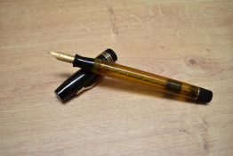 A Mabie Todd & Co Swan Capacity screw fill demonstrator fountain pen having Swan 2 14CT Mabie Todd &