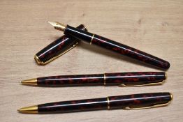 A Parker Sonnet converter fill fountain pen, ballpoint pen and propelling pencil set in Firedancer