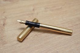 A Mabie Todd & Co Swan Lady eye dropper fountain pen in engine turned yellow metal having Swan 2