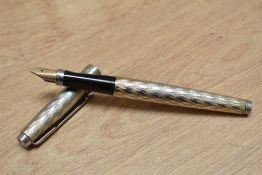 A Parker 75 Flamme aerometric fill fountain pen in silver fill.