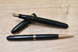 A Mabie Todd & Co Swan 4660 Leverless twist fill fountain pen and Fyne Poynt propelling pencil set