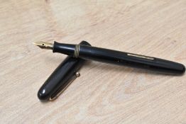 A Mabie Todd & Co Swan Self filler lever fill fountain pen in black having a Swan 14ct nib