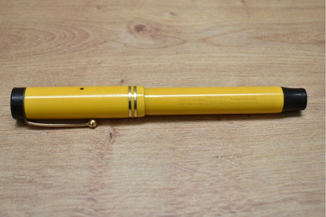 A Parker Duofold Senior Lucky Curve button fill fountain pen in mandarin yellow with two narrow - Image 3 of 3