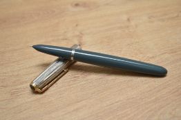 A Parker 51 aerometric fill fountain pen in navy grey with a rolled silver cap