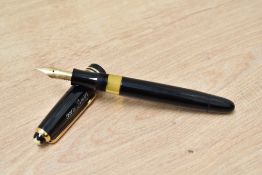 A Montblanc 244 piston fill fountain pen in black having Montblanc 14ct 585 nib