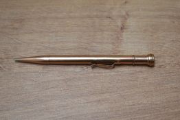 A rolled gold propelling pencil. Engraved