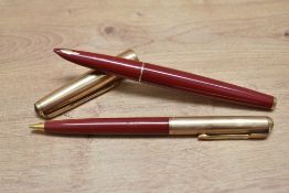 A Parker 61 Custom capillary fill fountain pen, and propelling pencil set in red with rolled gold