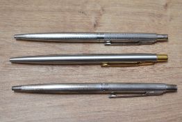 Three Parker ballpoint pens all require refills