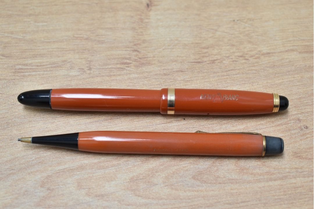 A rare Montblanc 214 button fill fountain pen and propelling pencil in coral red made in Denmark - Image 3 of 3