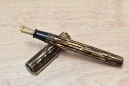 A Mabie Todd & Co Swan self Filler lever fill fountain pen in Brown and black striated design having