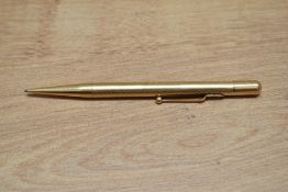 A Mabie Todd & Co Fyne Poynt propelling pencil in yellow metal.