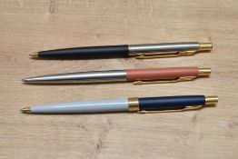 Three Parker Classic ballpoint pens in various combinations of Matte and brushed steel