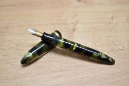 A Sheaffer Lifetime Balance lever fill fountain pen in marine green with white spot and single