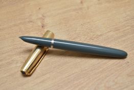 A Parker 51 aerometric fill fountain pen in navy grey with a gold filled cap