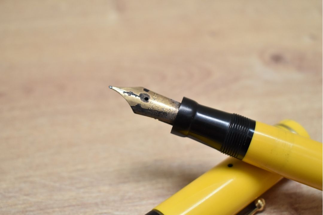 A Parker Duofold Senior Lucky Curve button fill fountain pen in mandarin yellow with two narrow - Image 2 of 3