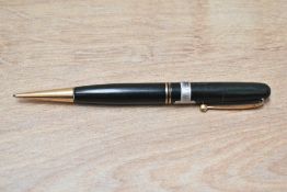 A Mabie Todd & Co Fyne Poynt 250 propelling pencil in bottle green. Still with paper band