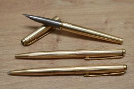 A Parker 50 Falcon Signet aero fill fountain pen, ballpoint pen and propelling pencil in gold