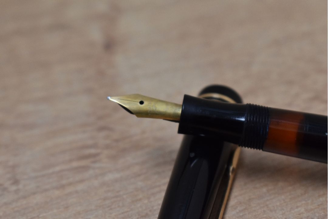 A Montblanc 242G piston fill fountain pen in black having Montblanc 14C 585 nib - Image 2 of 3