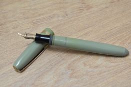 A Mabie Todd & Co Swan Calligraphy twist fill fountain pen in pastel green having Swan 2 K 14ct