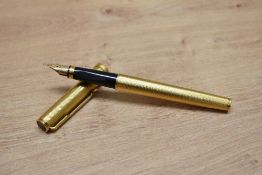 A Parker 75 Grain d'Orge aerometric fill fountain pen in rolled gold.