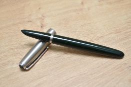 A Parker 51 aerometric fill fountain pen in forest green with brushed steel cap