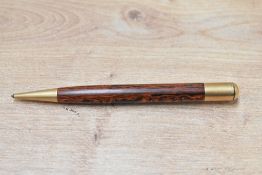 A small Mabie Todd Fyne Poynt propelling pencil in black and red hard rubber