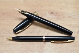 A Sheaffer Imperial IV button fill fountain pen and propelling pencil set in black with white spot