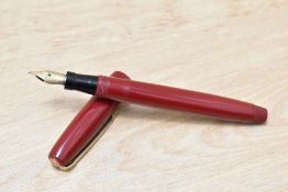 A Mabie Todd & Co Swan Leverless twist fill fountain pen in burgundy having Swan 2 K 14ct 585 nib