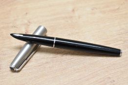 A Parker 61 cartridge fill fountain pen in black with brushed steel cap.