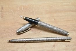 A Sheaffer Imperial Sovereign aerometric fill fountain pen and propelling pencil set in Sterling