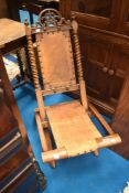 A 19th Century campaign style stained frame folding chair