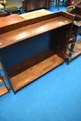 An early 20th Century oak low bookshelf