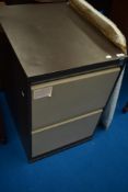 A modern metal two drawer filing cabinet