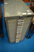 A set of vintage metal filing drawers