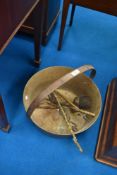 A brass jam pan and selection of fire tools