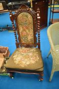 A Victorian prayer style chair with tapestry seat and back , twist frame to back, on shaped legs