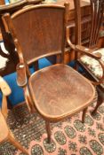 A vintage bentwood carver chair