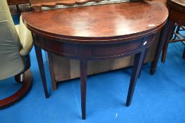 A 19th Century mahogany fold over side table of oval form, approx 97 x 81cm