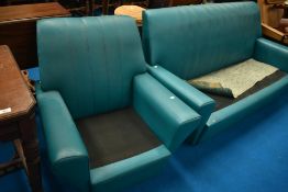 A vintage vinyl settee and chair, in teal, sold as upholstery project/collectors item