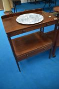 An Edwardian mahogany washstand with later Blakeney wash bowl having blue and white pattern