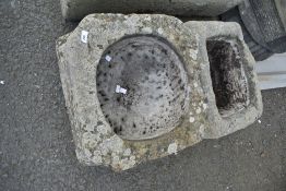 Two stone troughs