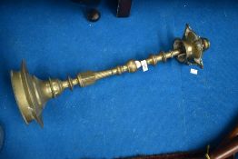 An eastern brass candlestick/smokers stand, height approx 64cm.