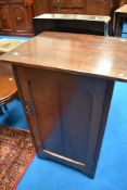 A late 19th or early 20th Century oak side cabinet having Art Nouveau style handle, dimensions