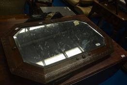 An early 20th Century oak canted wall mirror, width approx 79cm