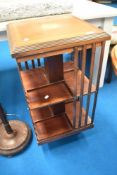 An Edwardian mahogany revolving bookcase