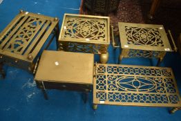 A selection five of antique brass footman/footmen