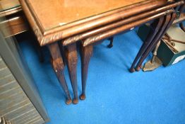 A period style reproduction nest of three tables