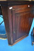 A 19th Century oak corner cupboard